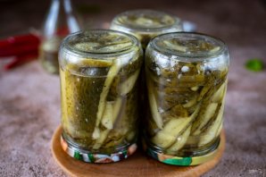 Огурцы, консервированные дольками Огурцы, консервированные дольками